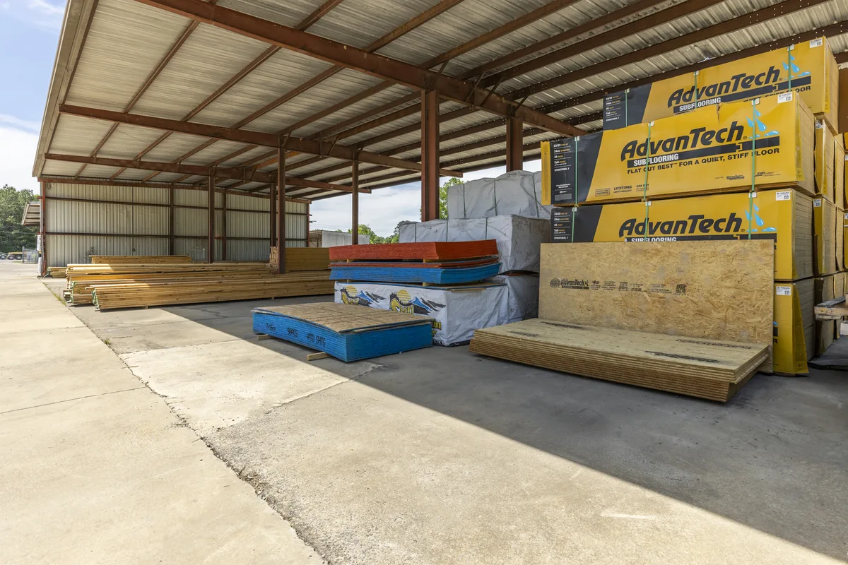 Covered lumber storage in the Etowah Builders Supply yard